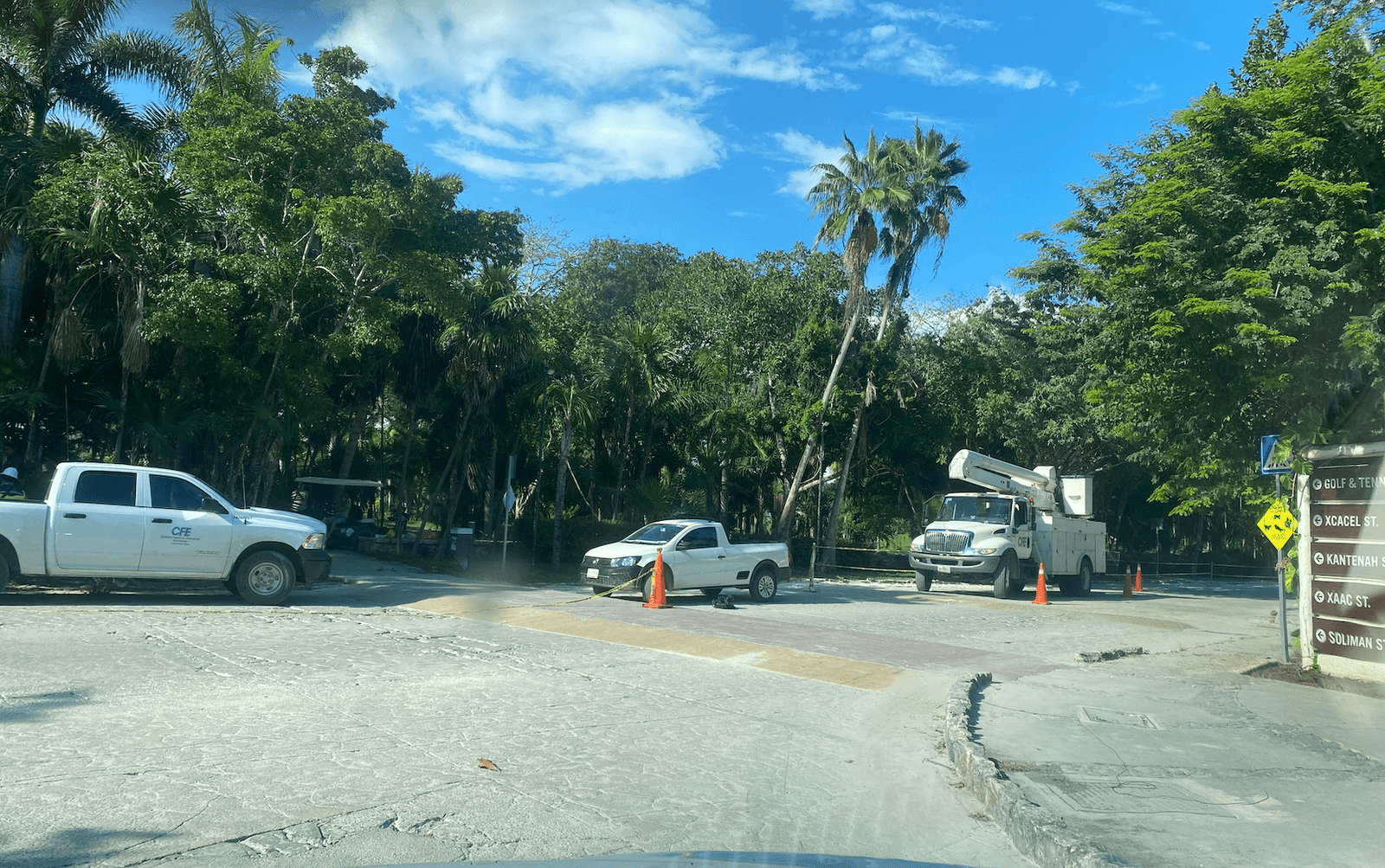 CFE Trucks repairing lines in Puerto Aventuras