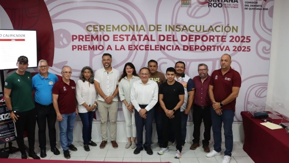 A group of people standing in front of a banner for the State Sports Awards 2025 ceremony