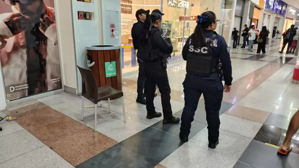 police officers standing in a shopping mall-08102025