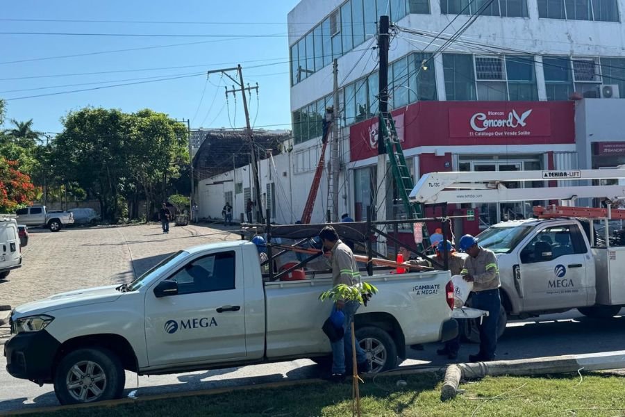 workers preparing equipment near a building with construction vehicles and tools-23102025