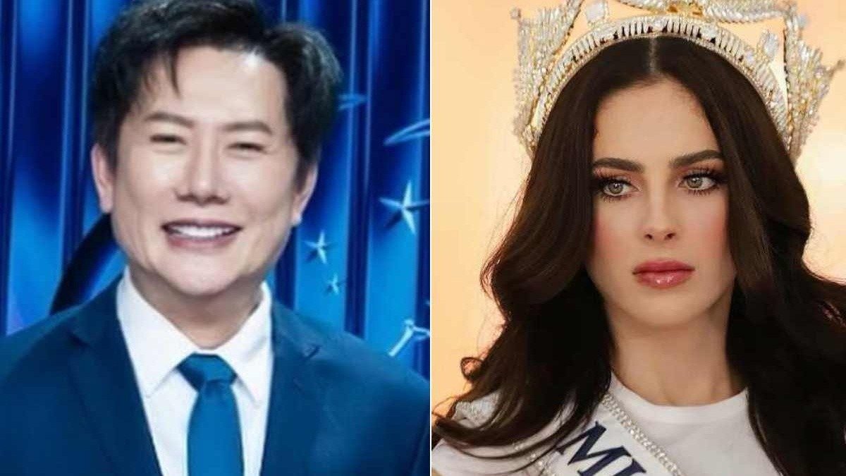 A man in a blue suit smiling on the left, and a woman with a crown and pageant sash on the right, with a neutral background.$# CAPTION