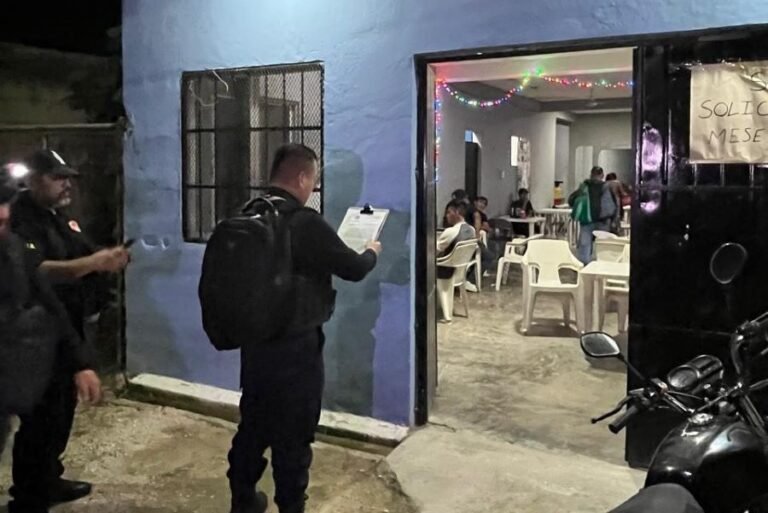 Law enforcement operation at a bar in Cancún during human trafficking investigation