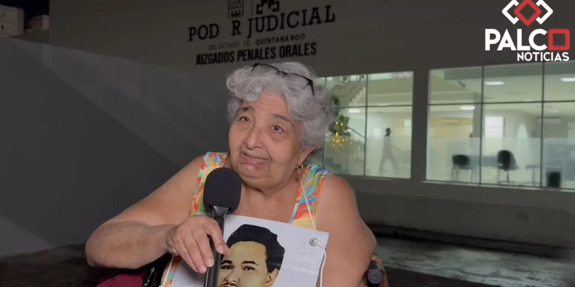 Carmen Peón holding a sign during a protest for justice