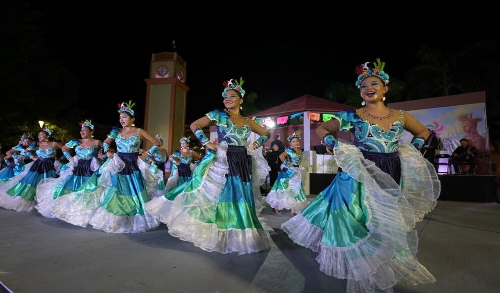 Photographs of Cozumel sunsets displayed at the anniversary event