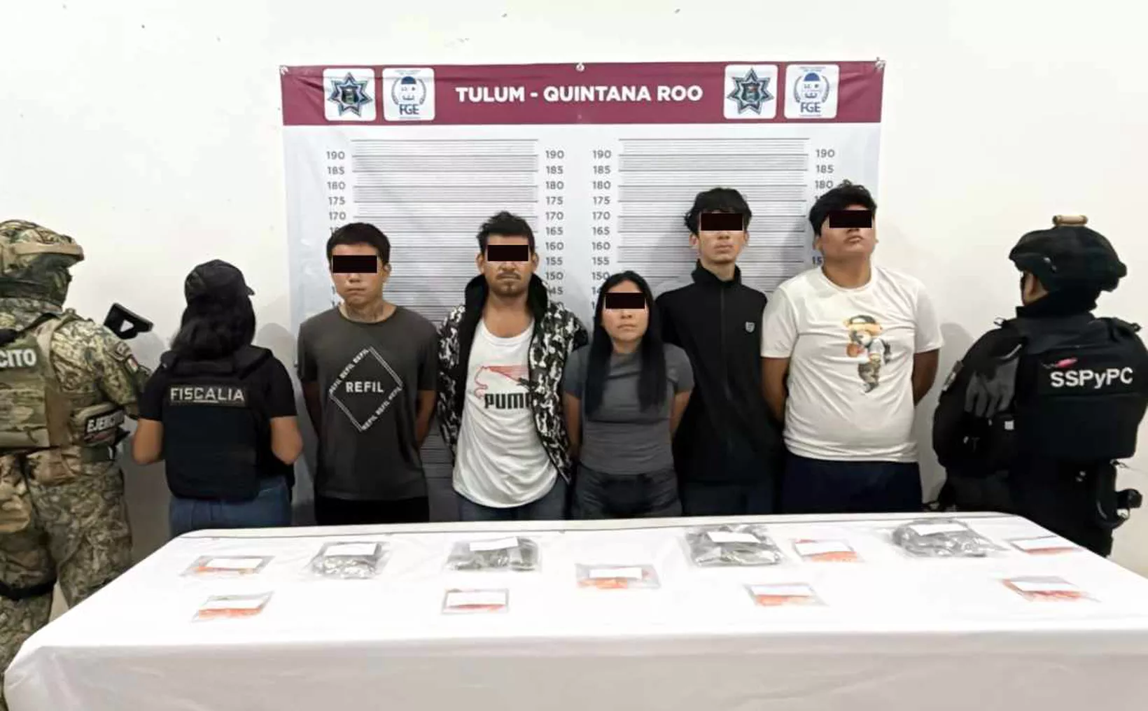 Photo of individuals arrested for drug dealing in Tulum