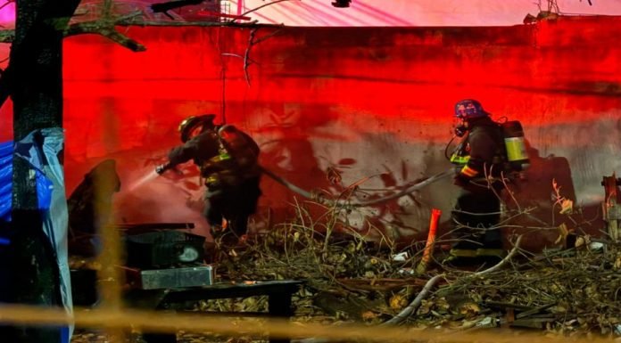 Firefighters responding to a blaze in a vacant lot in Playa del Carmen