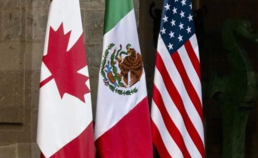 Three national flags representing Canada, Mexico, and the United States, arranged side by side.$