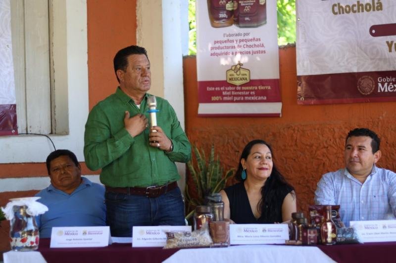 Officials and beekeepers at a honey collection center in Yucatán