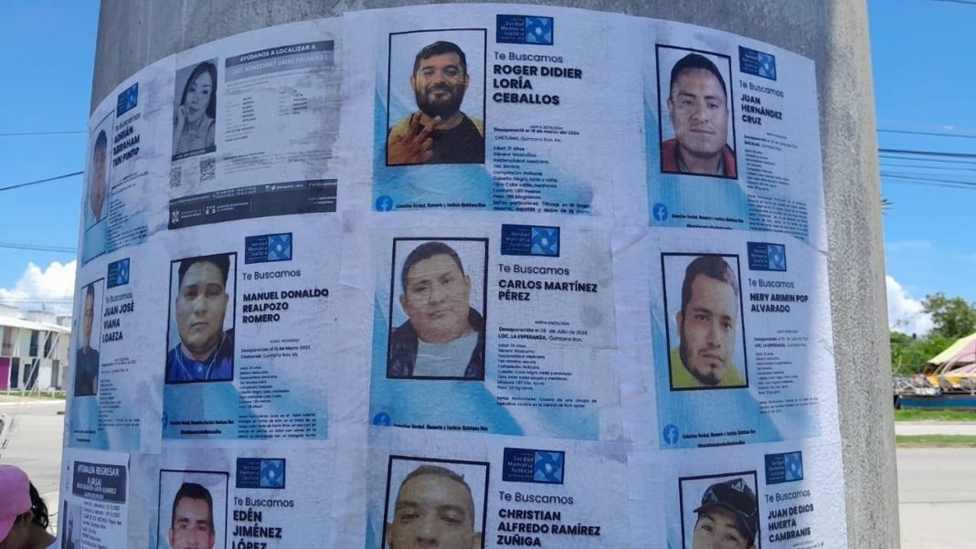 A collection of missing persons posters displayed on a utility pole in a community setting, featuring various individuals' photos and details.