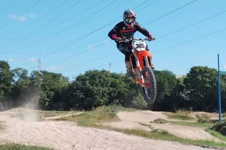 Motocross riders competing at the José Quiam Chan track in Playa del Carmen