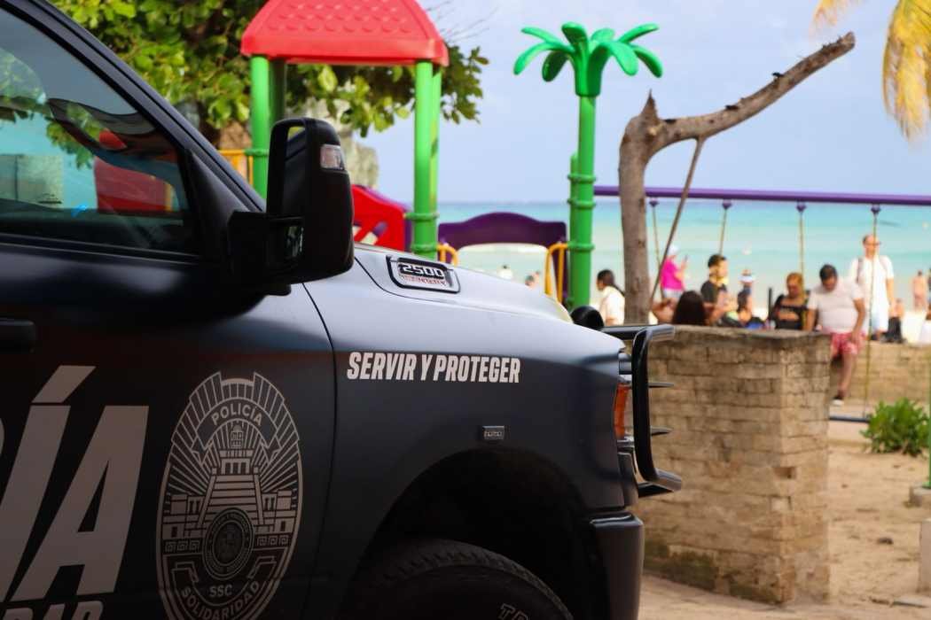 Police officers patrolling the beach area in Playa del Carmen