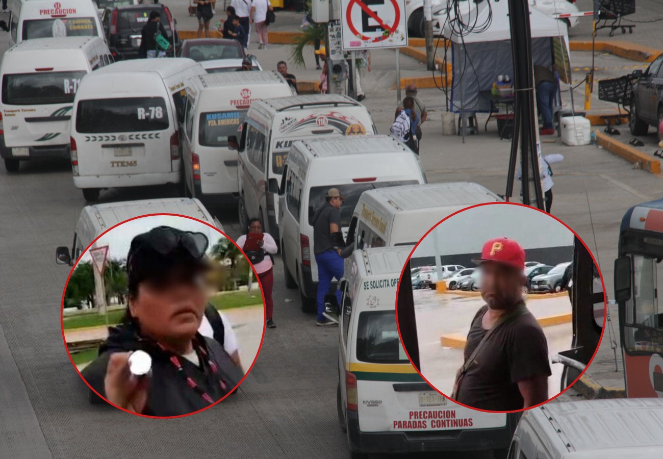 A busy street scene featuring multiple vans and two individuals in focus, one holding a small object. The background includes other people and vehicles around a transportation hub.