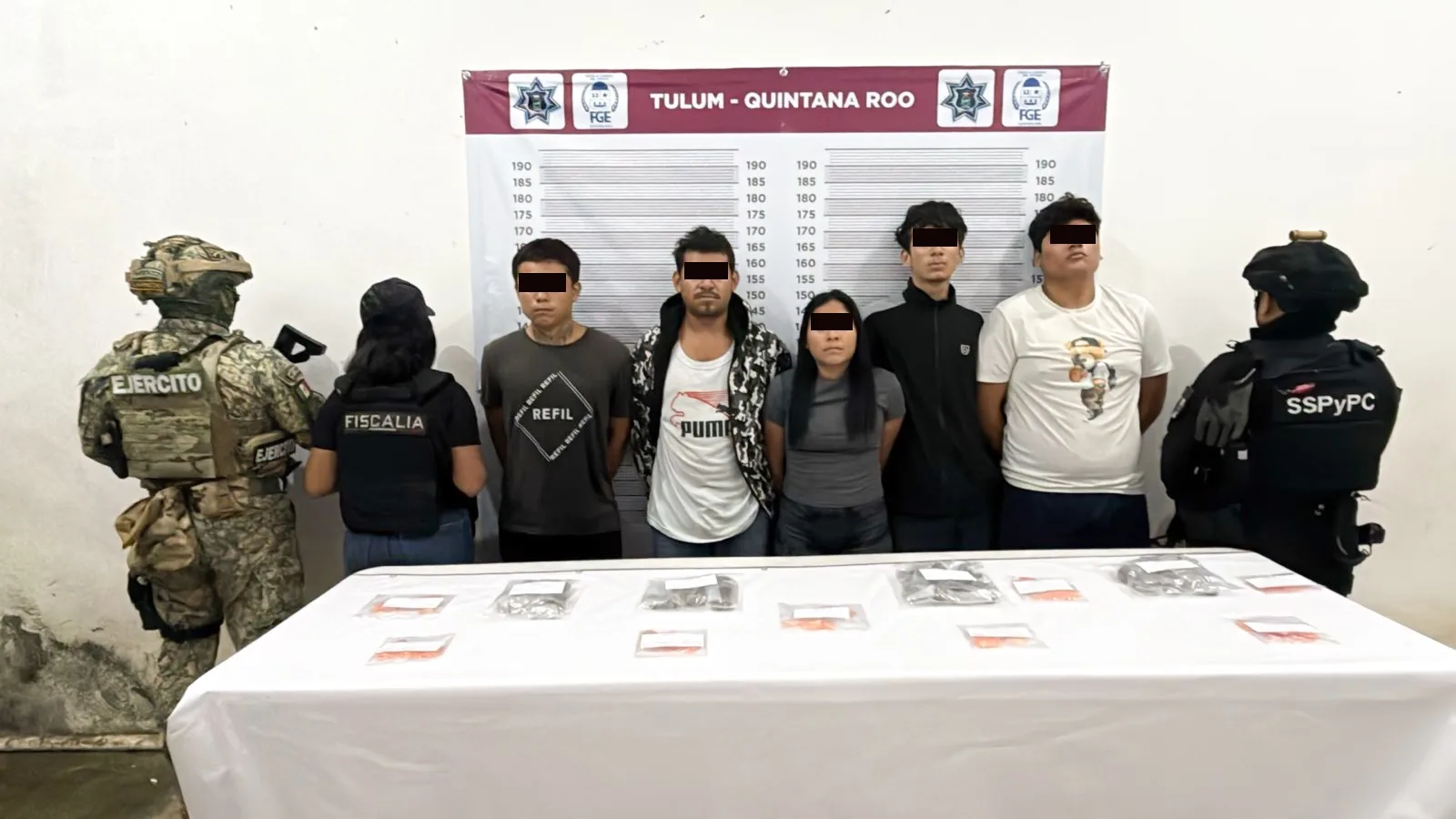 Law enforcement officers conducting an operation in Tulum