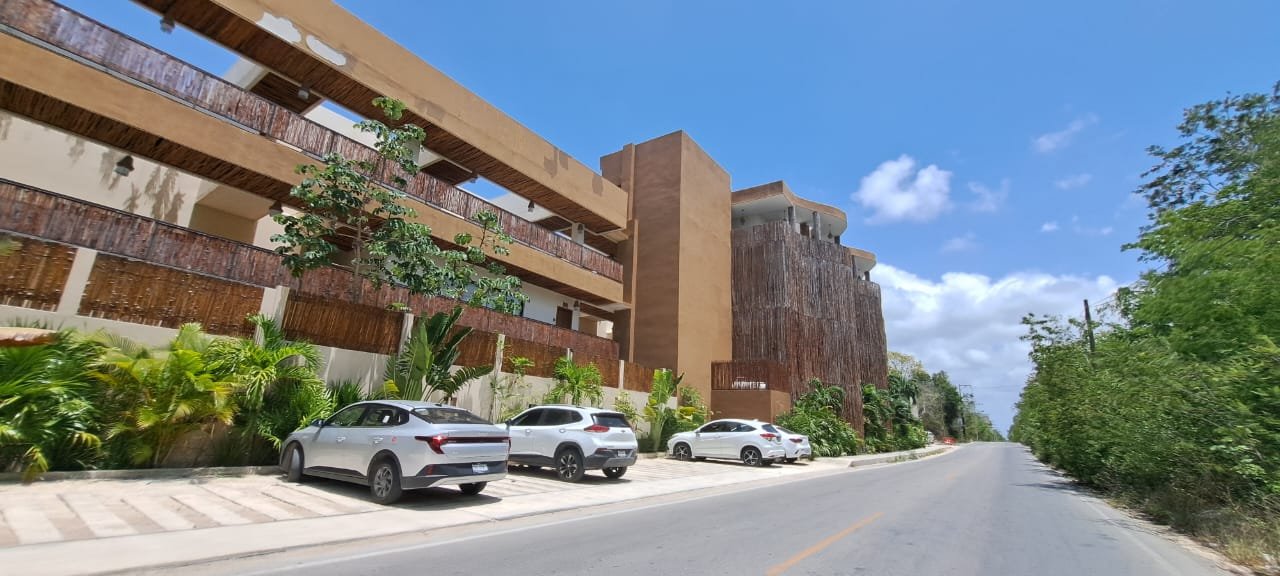 A view of Tulum showing real estate developments and urban landscape