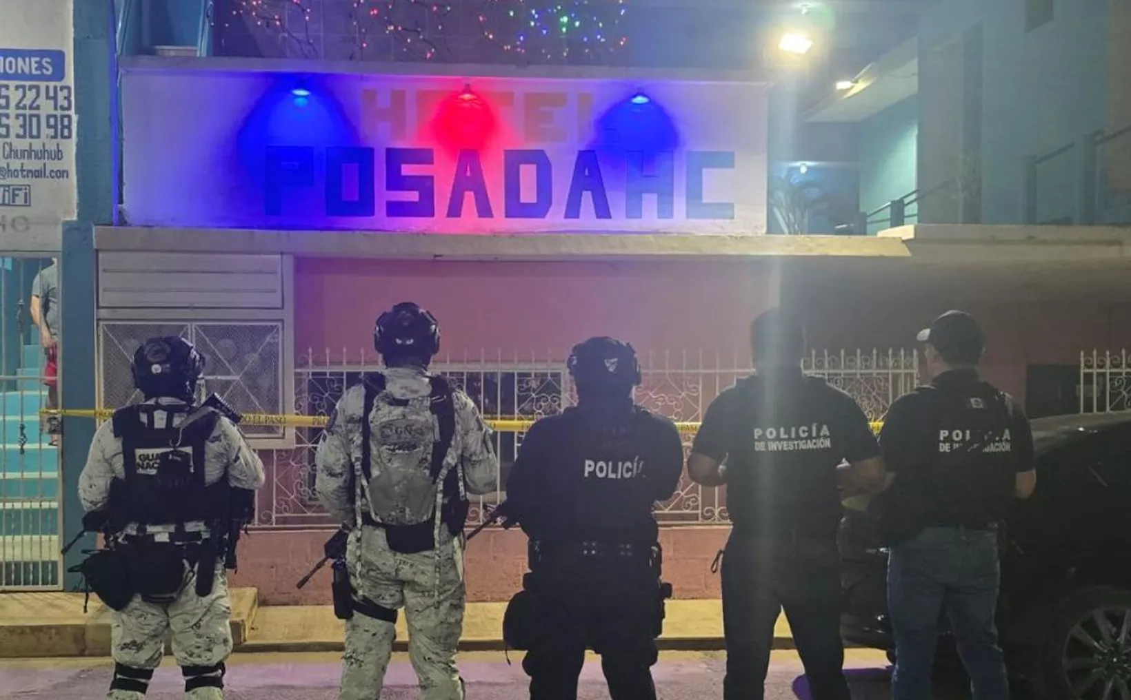 Authorities conducting a raid at a motel in Quintana Roo where hidden cameras were discovered