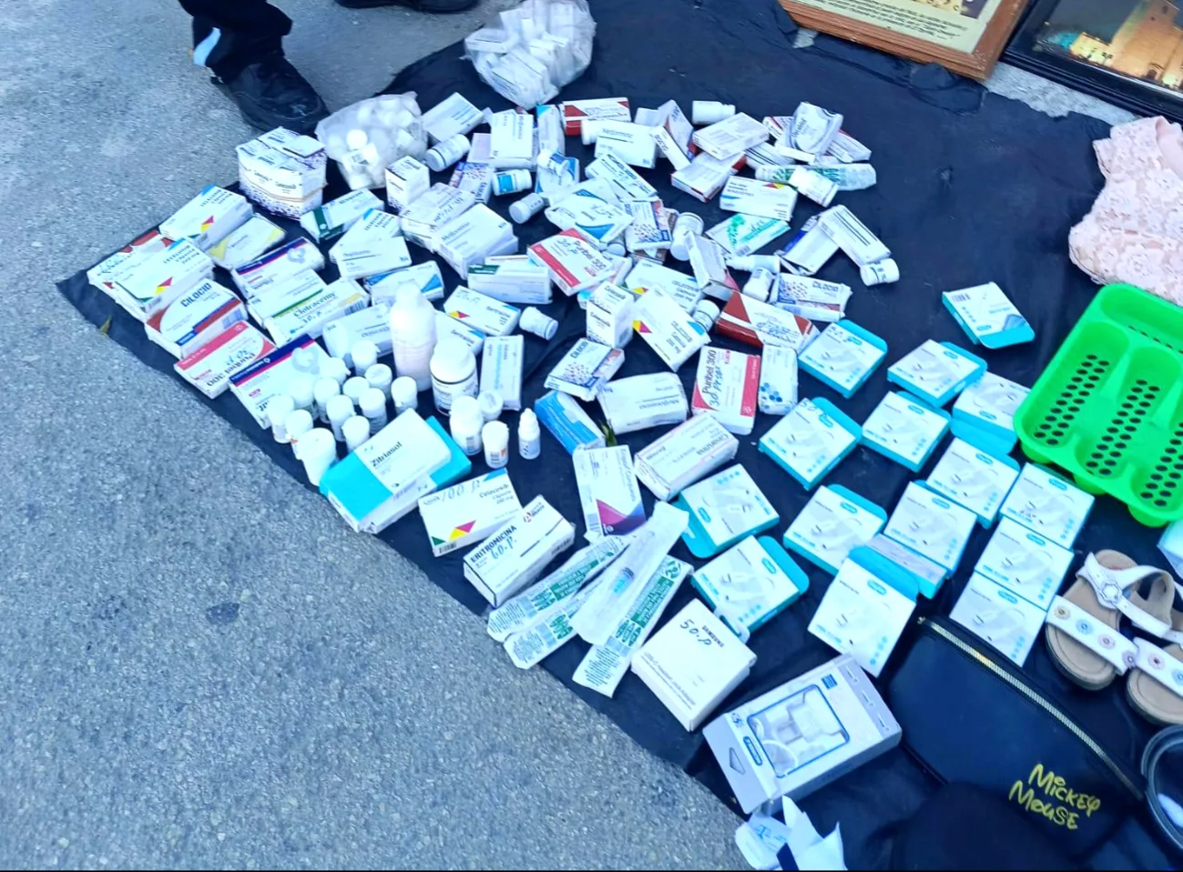 People buying medications at a flea market in Cancún