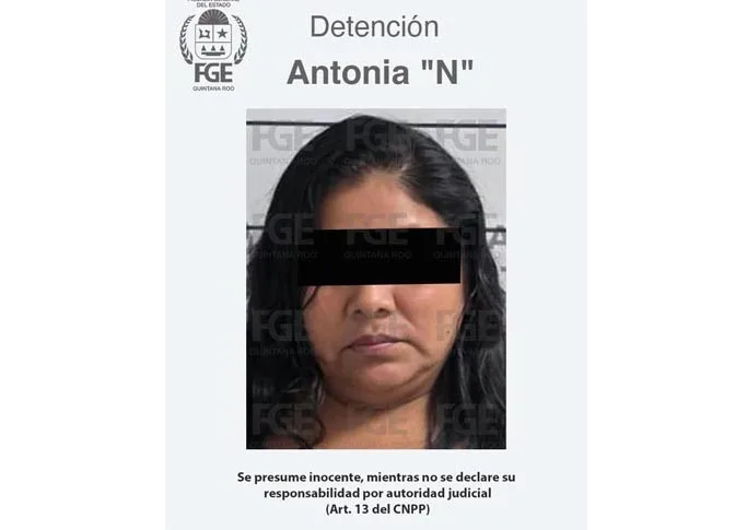Authorities conducting a raid at a human trafficking location in Cancún