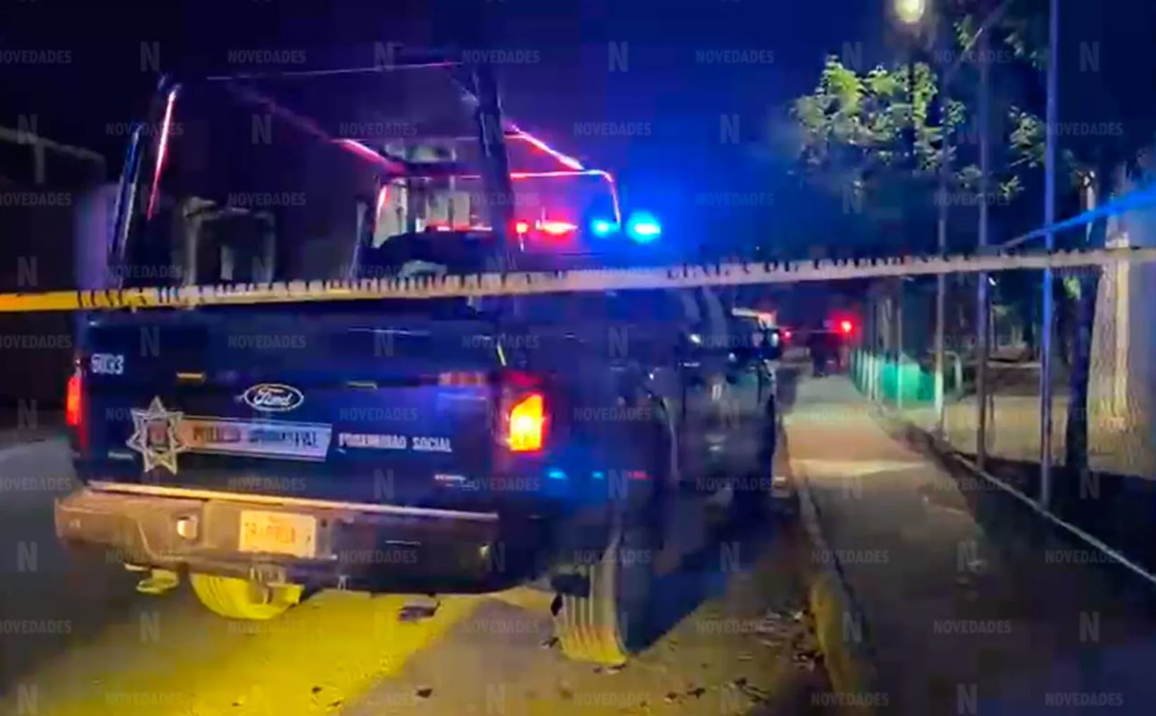 Police cordon off the scene of a mototaxi shooting in Cancún's Villas Otoch neighborhood