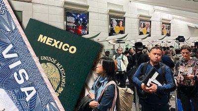 CBP agent inspecting electronic device at border
