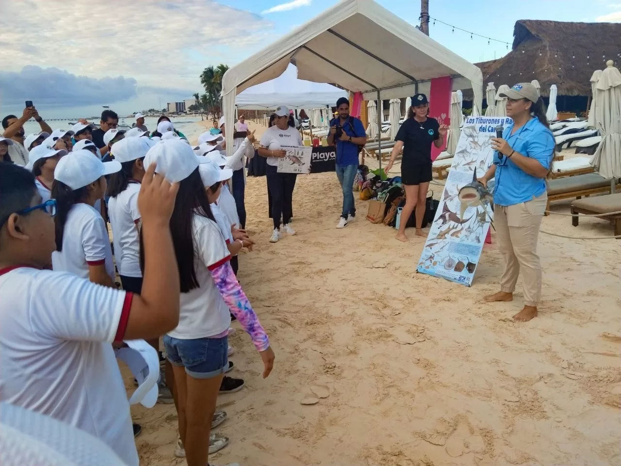 Children from vulnerable areas enjoying activities at Playa Pelicanos in Playa del Carmen