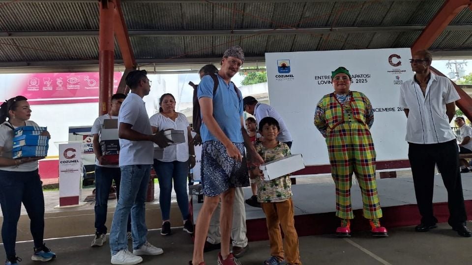 Children in Cozumel receiving new shoes during Loving Steps 2025 event