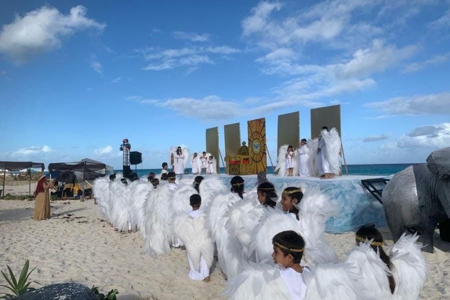 Actors performing the Christmas story on Playa Delfines beach in Cancún