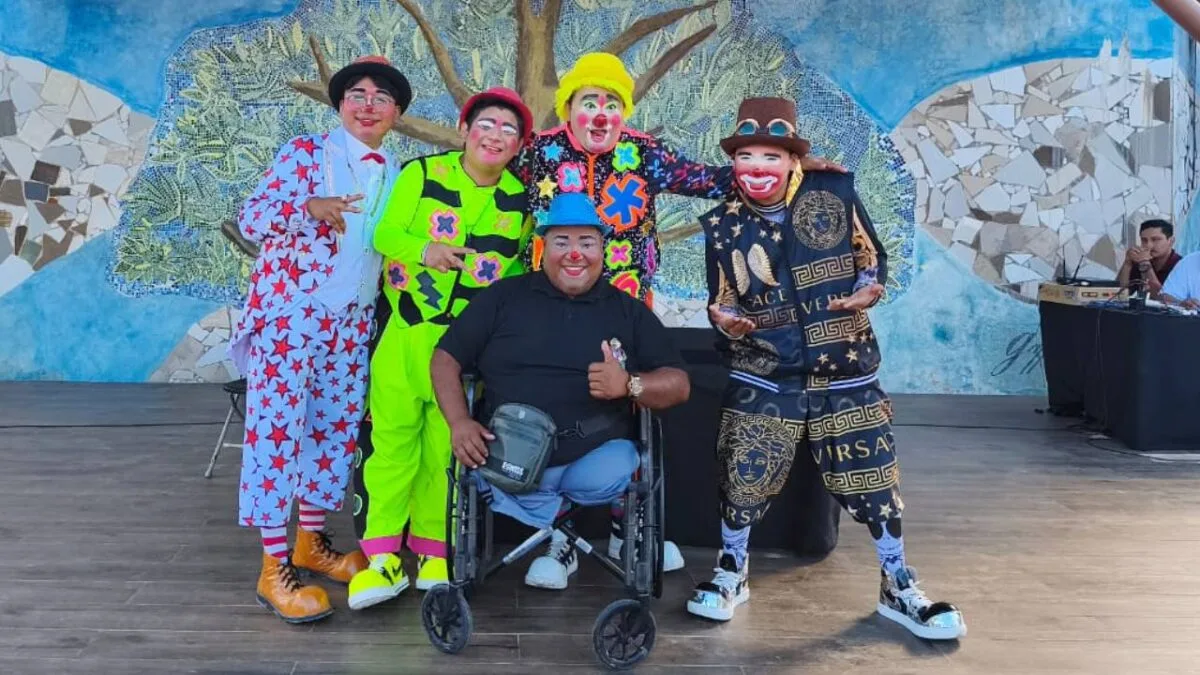 Colorful Clown Day parade in Cancún with performers and community members
