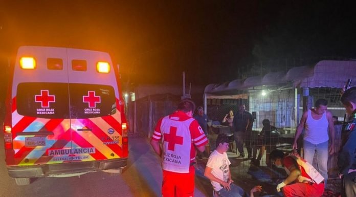 Emergency response at cyclist accident scene in Tulum