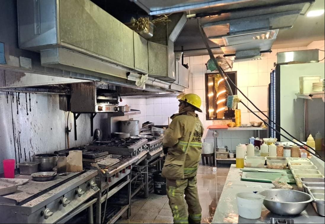 Firefighters responding to a kitchen fire at a restaurant in Cancún's Hotel Zone