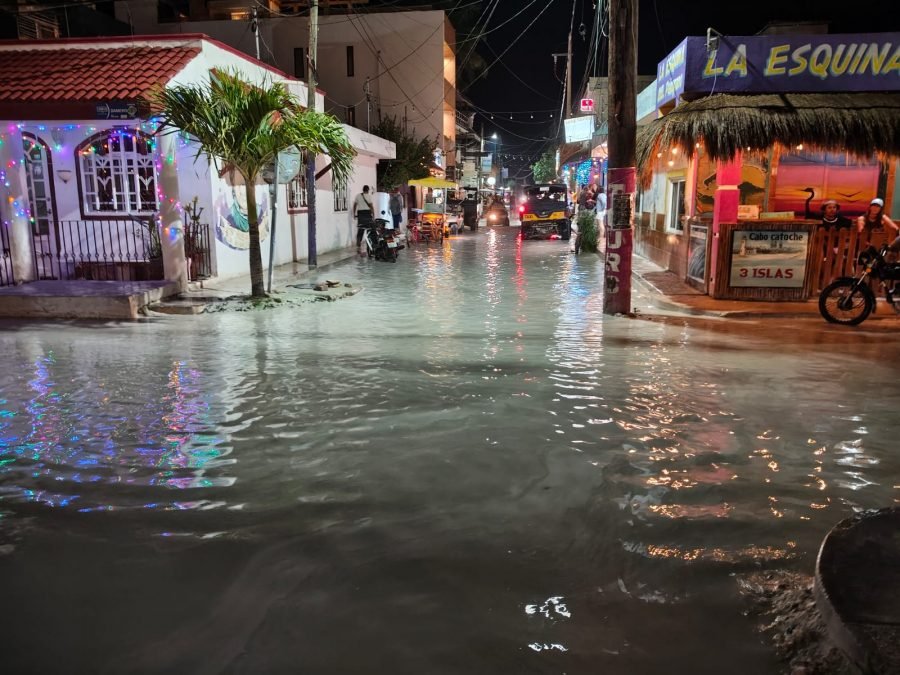 Flooded streets in Holbox after light rain