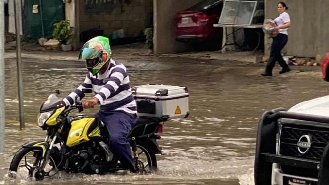 Flooded streets in Playa del Carmen after heavy rainfall