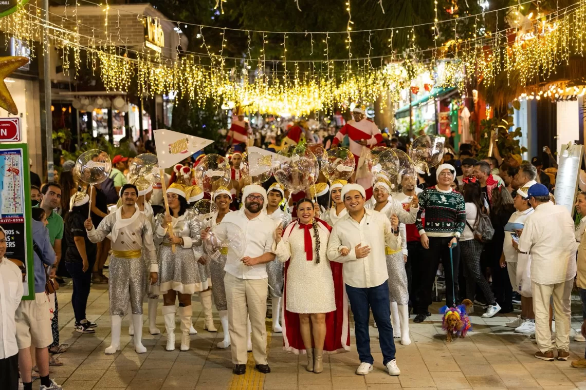 Crowds watching the Grand Christmas Parade on Fifth Avenue in Playa del Carmen