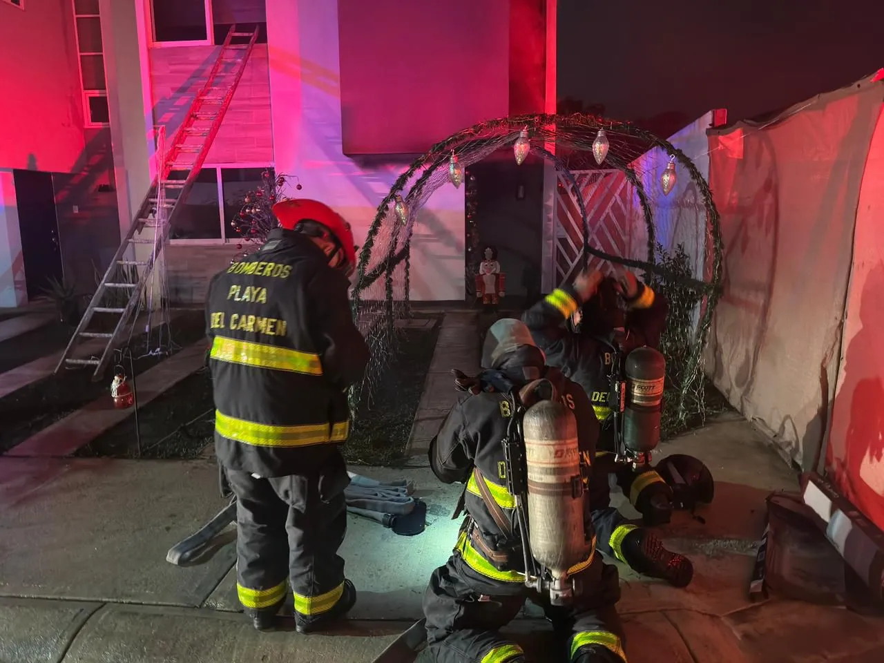 Firefighters respond to a house fire in Playa del Carmen's Bonanza neighborhood