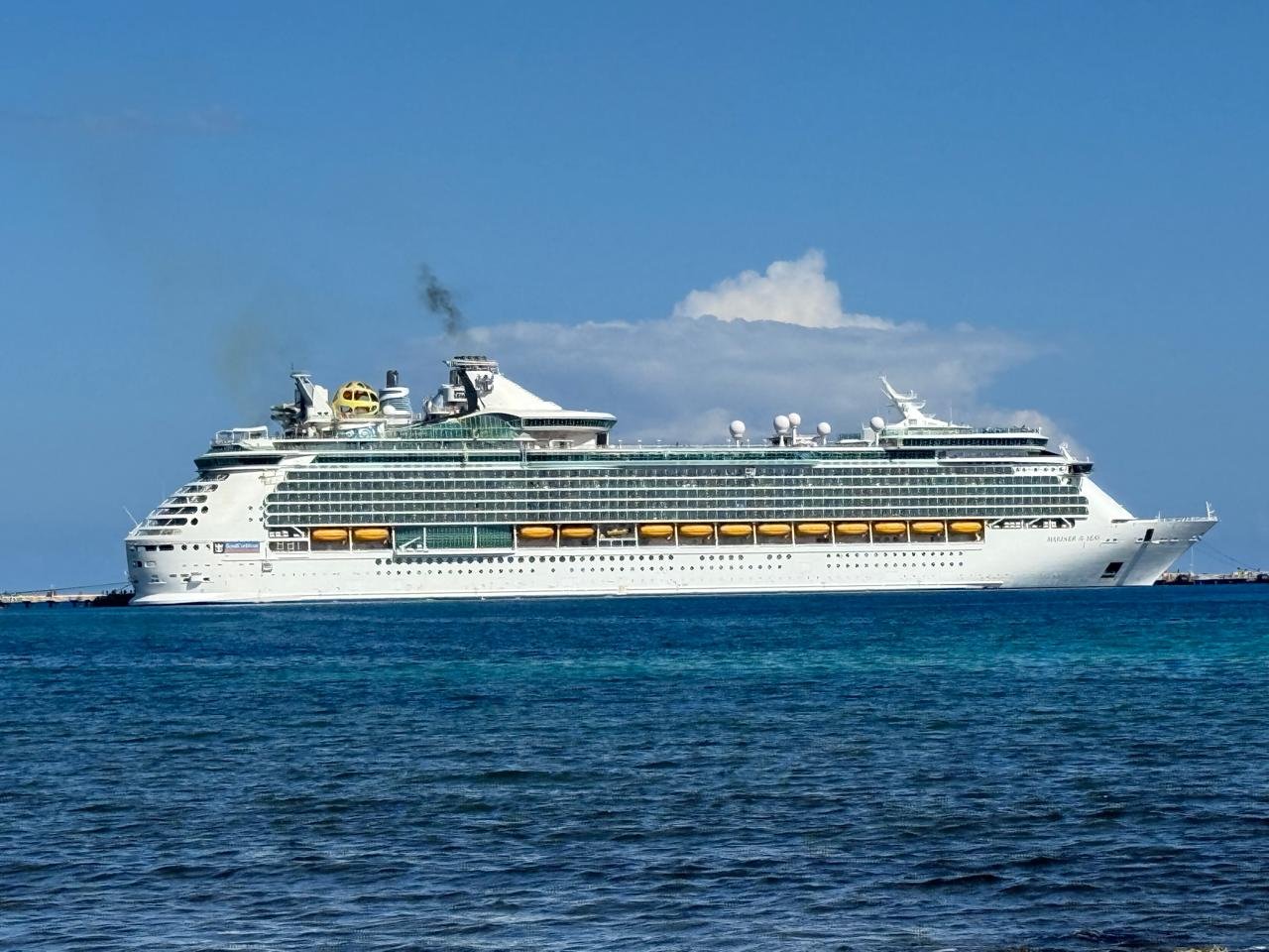 Cruise ship docked at Mahahual port during tourism crisis