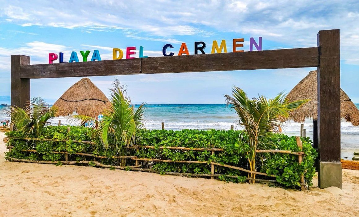 Aerial view of Playa del Carmen showing urban development and natural areas