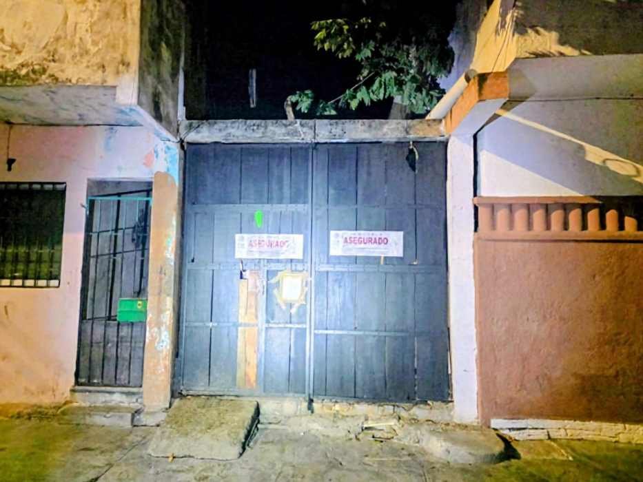 Police officers conducting a raid in Playa del Carmen