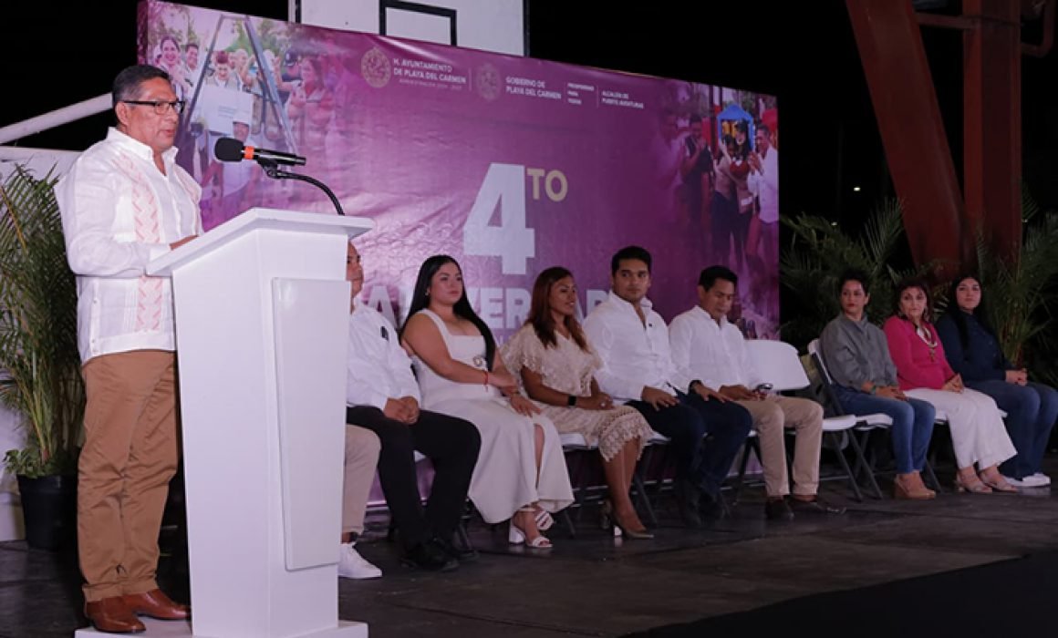 Officials and community members gather for Puerto Aventuras anniversary ceremony