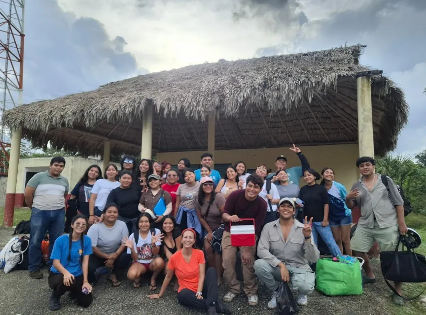 University students presenting their work for an ecotourism cooperative