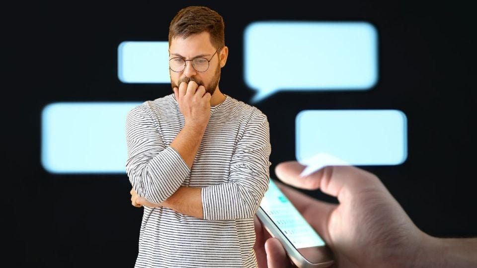 Illustration showing WhatsApp logo with older smartphone models