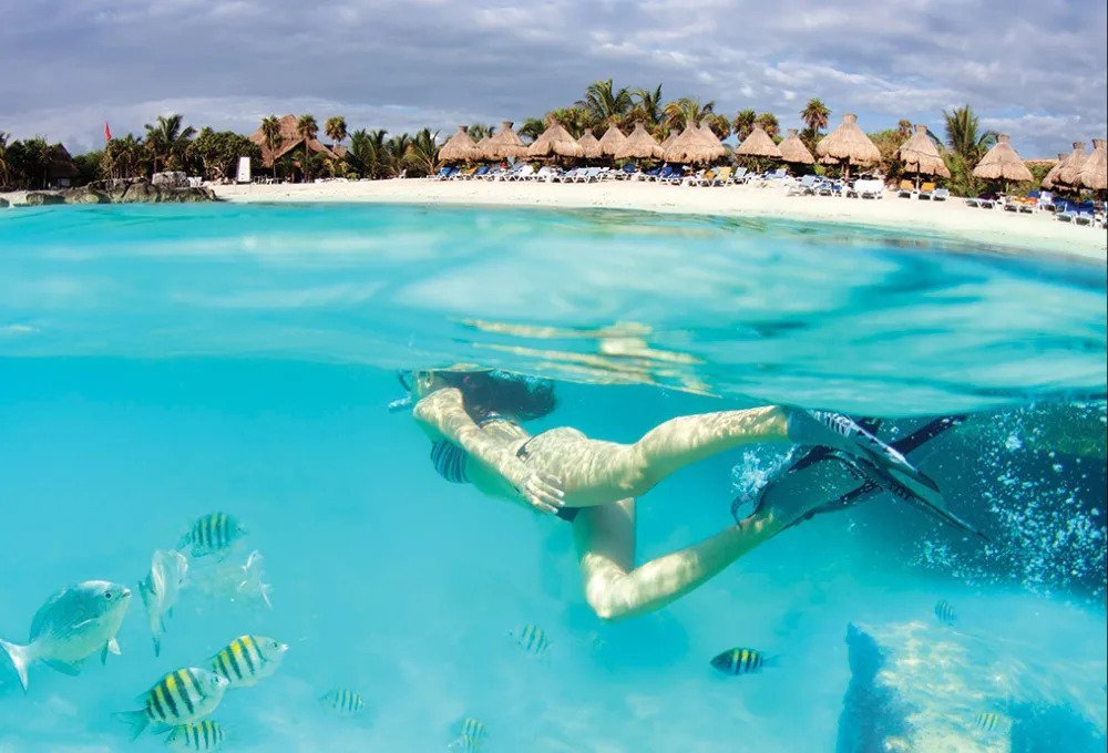 A view of Riviera Maya coastline with luxury hotels