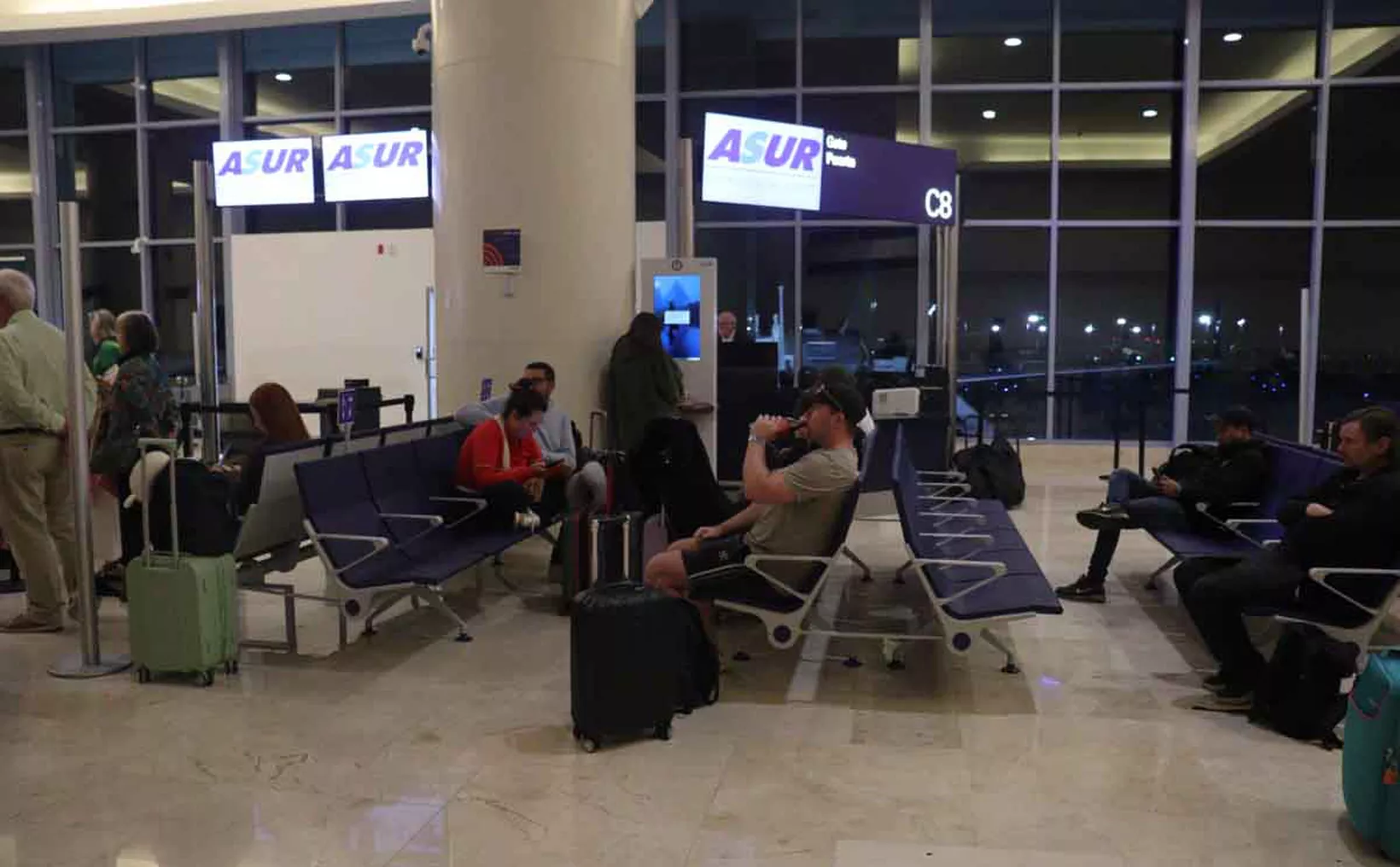 Aerial view of Cancún International Airport with grounded planes during winter storm disruptions