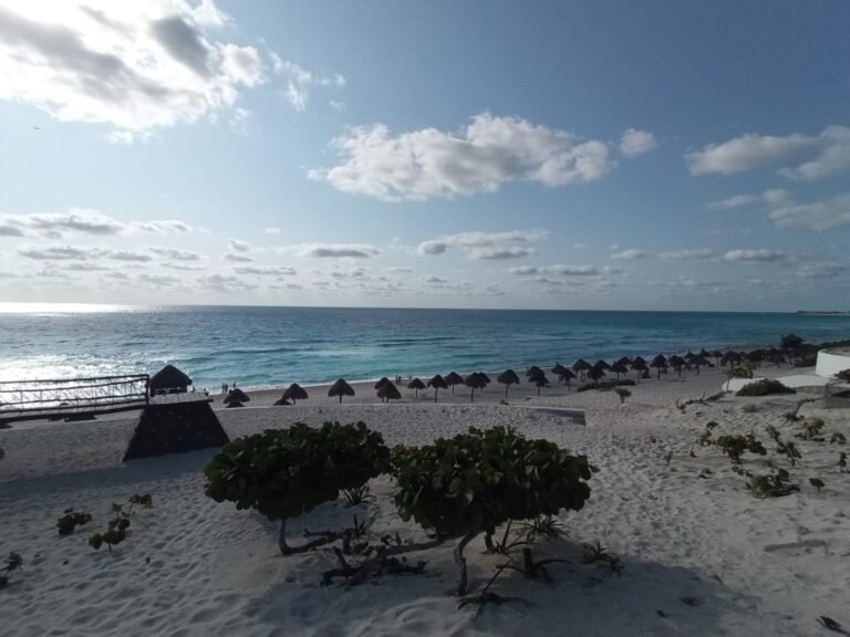 A crowded beach in Cancún during a long weekend