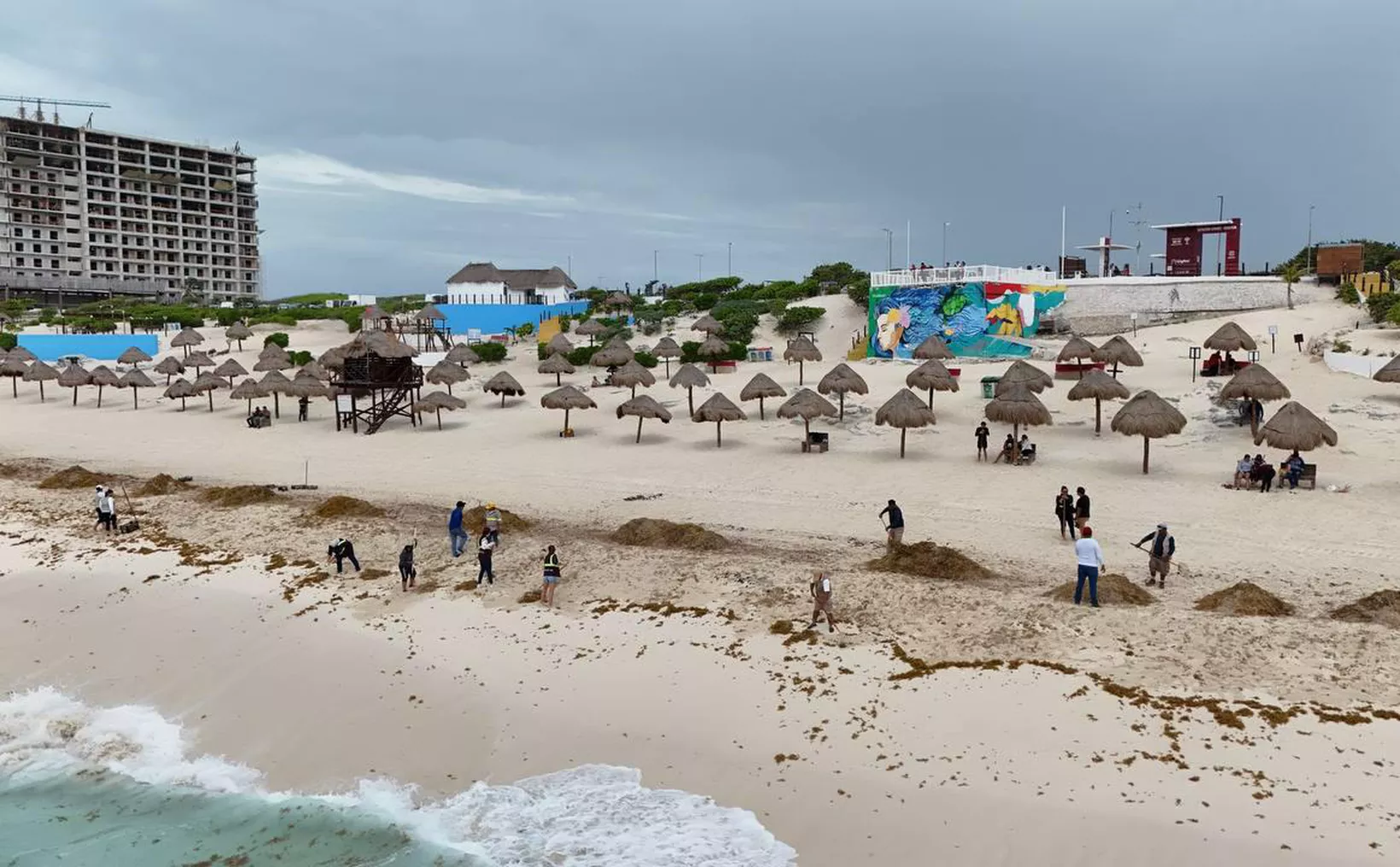 Aerial view of sargassum accumulation along the coast of Cancún, Mexico.