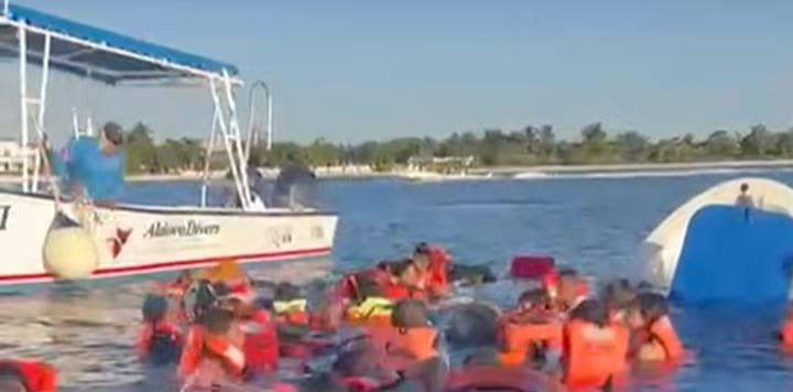 Rescue operation for a capsized boat carrying tourists in Cozumel