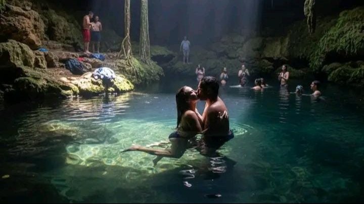 Police arresting a couple at Zací Cenote in Valladolid, Yucatán
