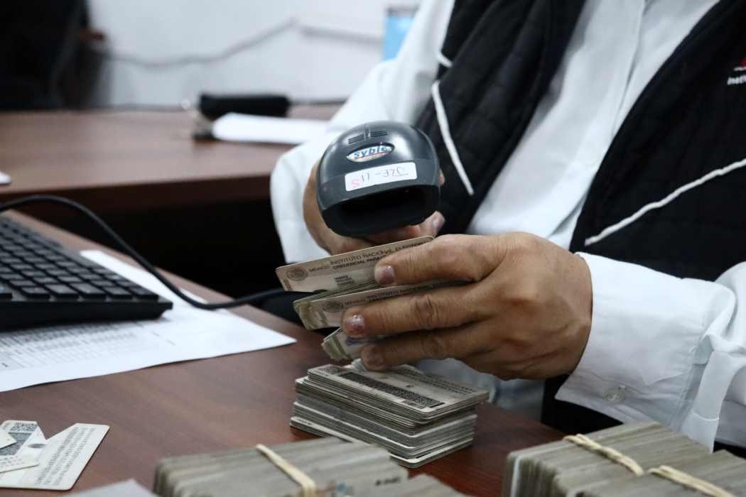 INE officials destroying voter ID cards in Quintana Roo