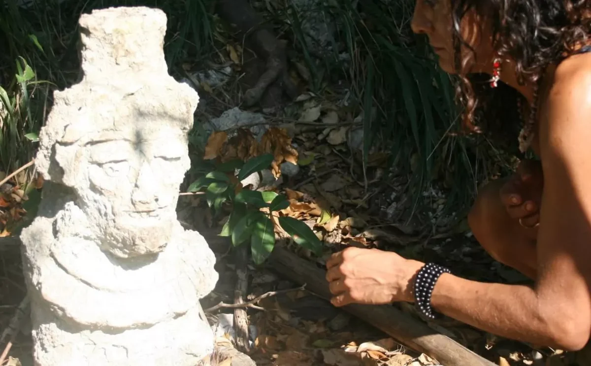 A stone monolith depicting the Maya deity Itzamna, discovered in Playa del Carmen in the 1990s