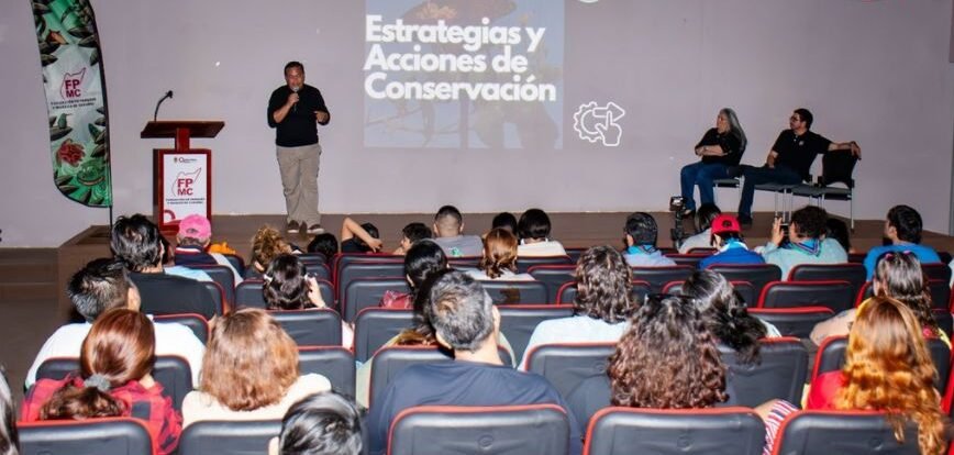 Conference participants learning about monarch butterfly conservation in Cozumel