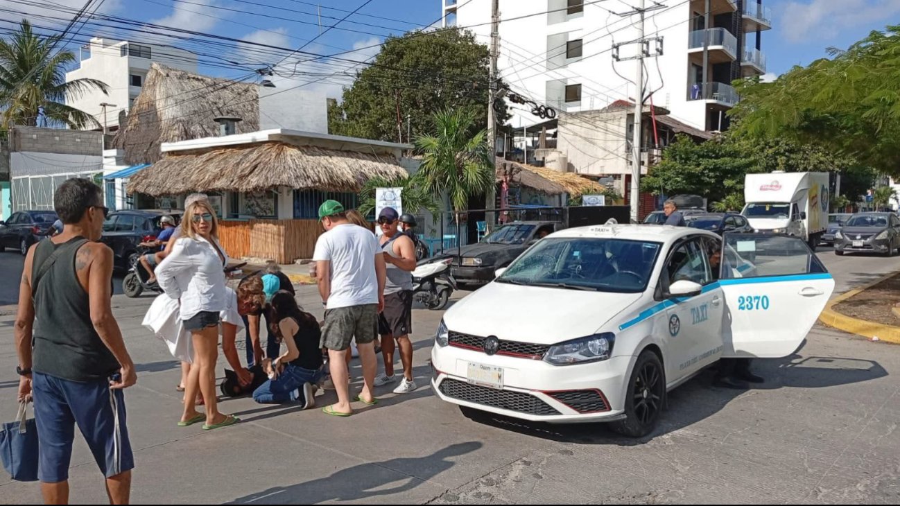 Paramedics providing prehospital care to a tourist struck by a taxi on CTM Avenue in Playa del Carmen