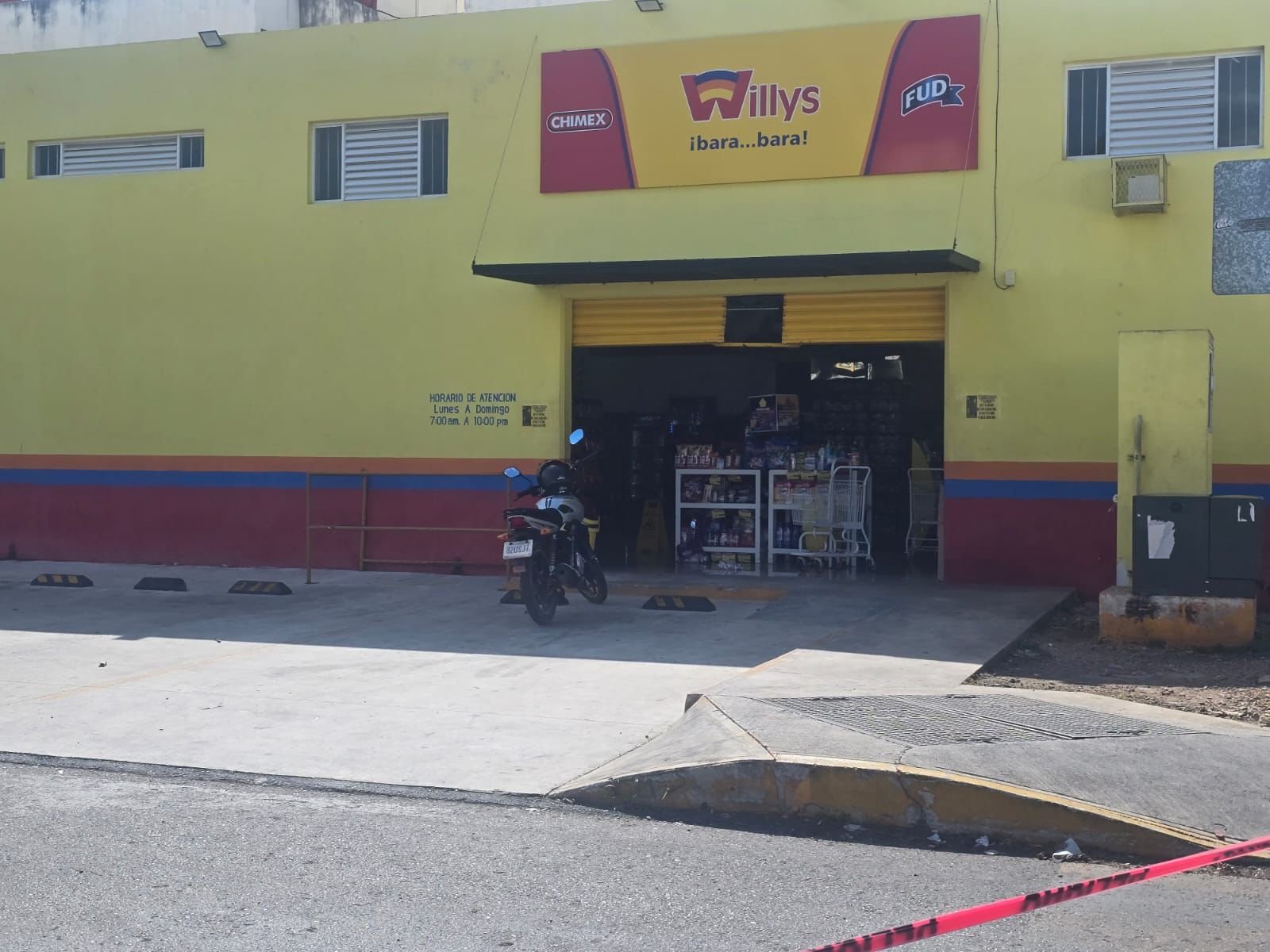 Scene outside a grocery store in Playa del Carmen where a shooting occurred
